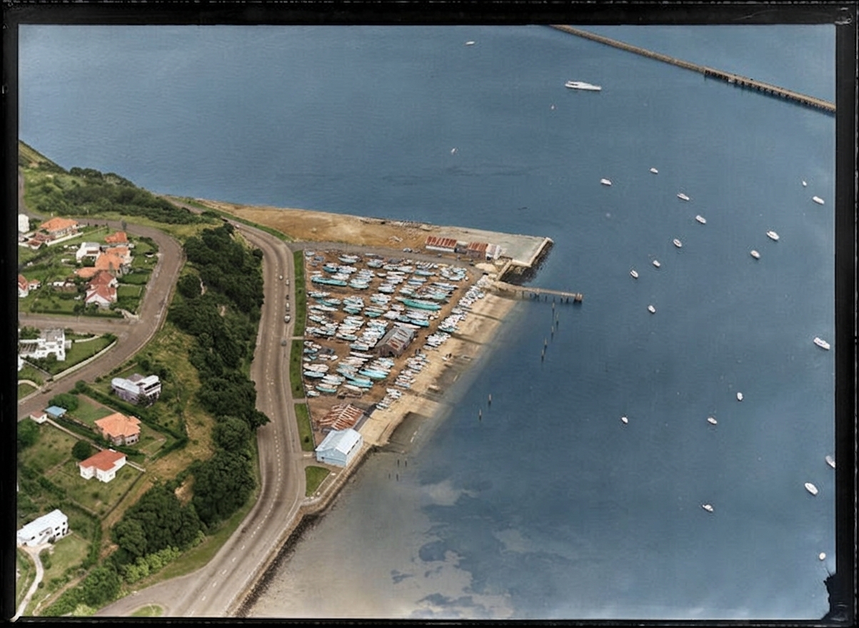 AI colourised photograph: Okahu Bay, Auckland, showing Royal Akarana Yacht Club besides Tamaki Drive and Paritai Drive