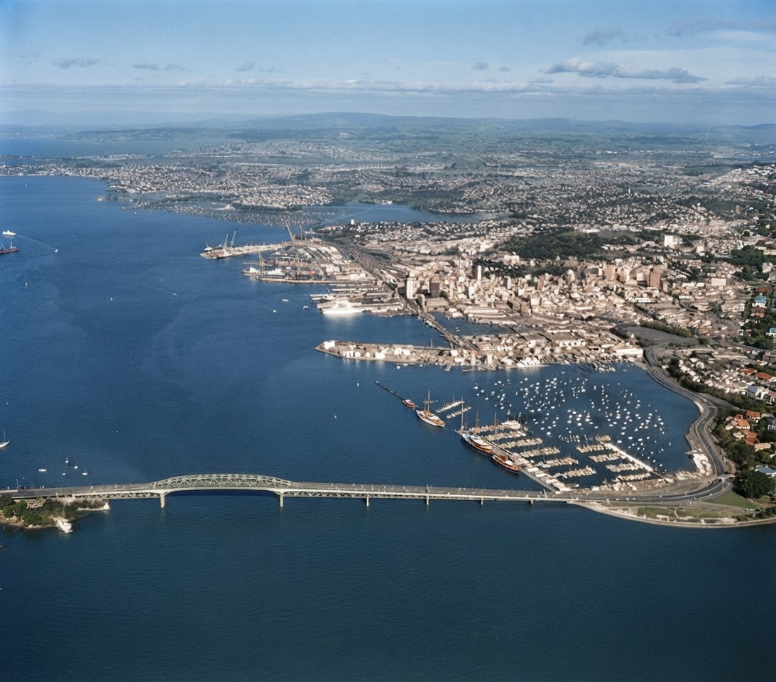AI colourised photograph: Auckland wharves, including Auckland Harbour Bridge in the foreground