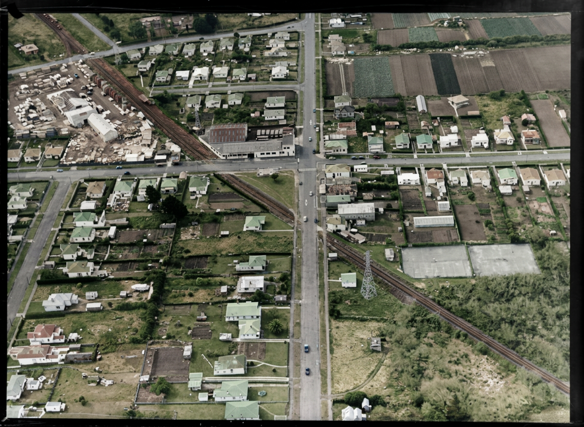 AI colourised photograph: Church Street, Onehunga, Auckland, including railway tracks