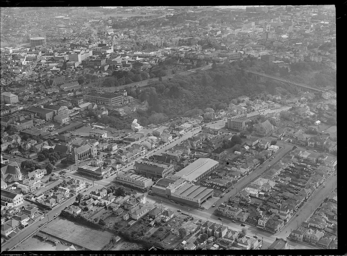 Original photograph: Four Square building on Khyber Pass Road with Grafton Street Bridge and Auckland City centre beyond