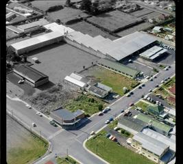 [Mt Roskill/Onehunga area, Auckland ?] including premises of Keith Hay Ltd and a building with the sign 'Sure To Rise'